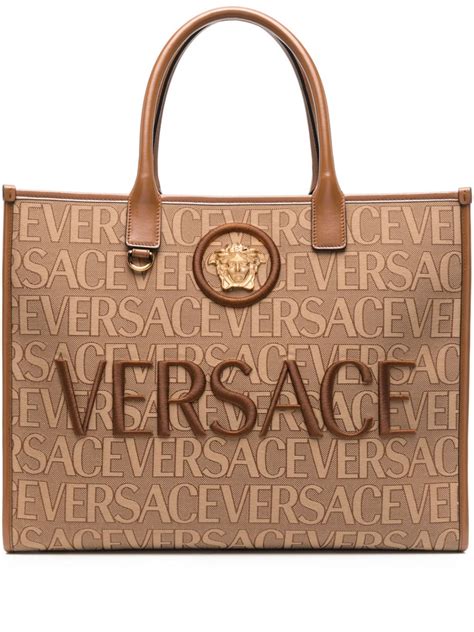 versace croissant bag|farfetch Versace bag.